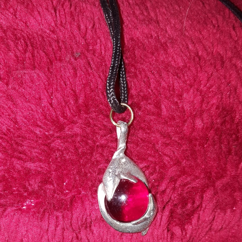 red dolphins necklace